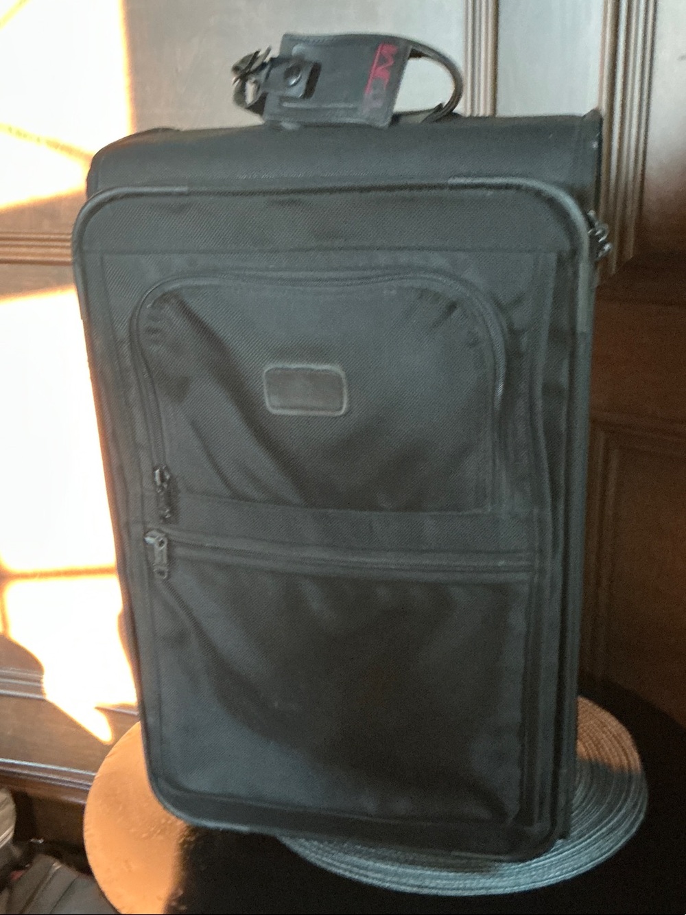 Tumi Black Soft-Sided Upright Carry-On with Front Pockets